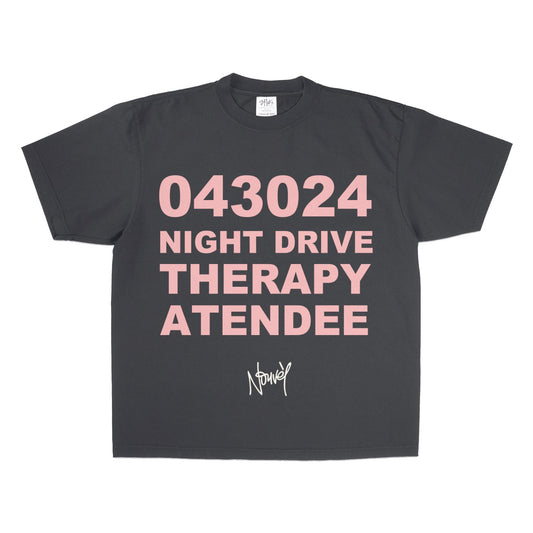 Pink puff text on a black acid-wash tee