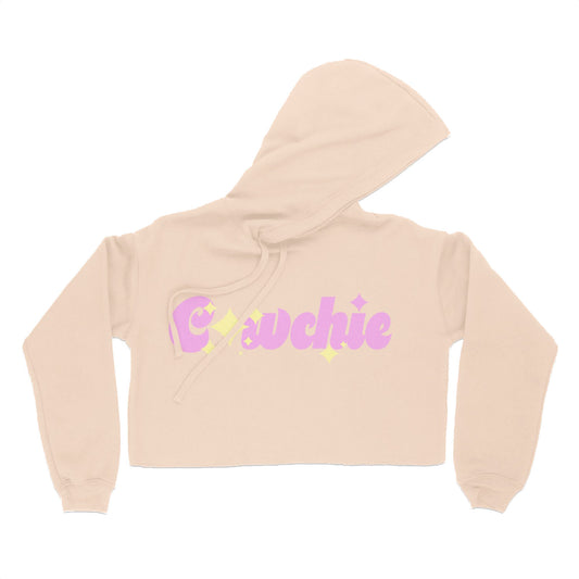 A sleek cream crop top adorned with playful pink text spelling "Cewchie," complete with a star dotting the 'i'.